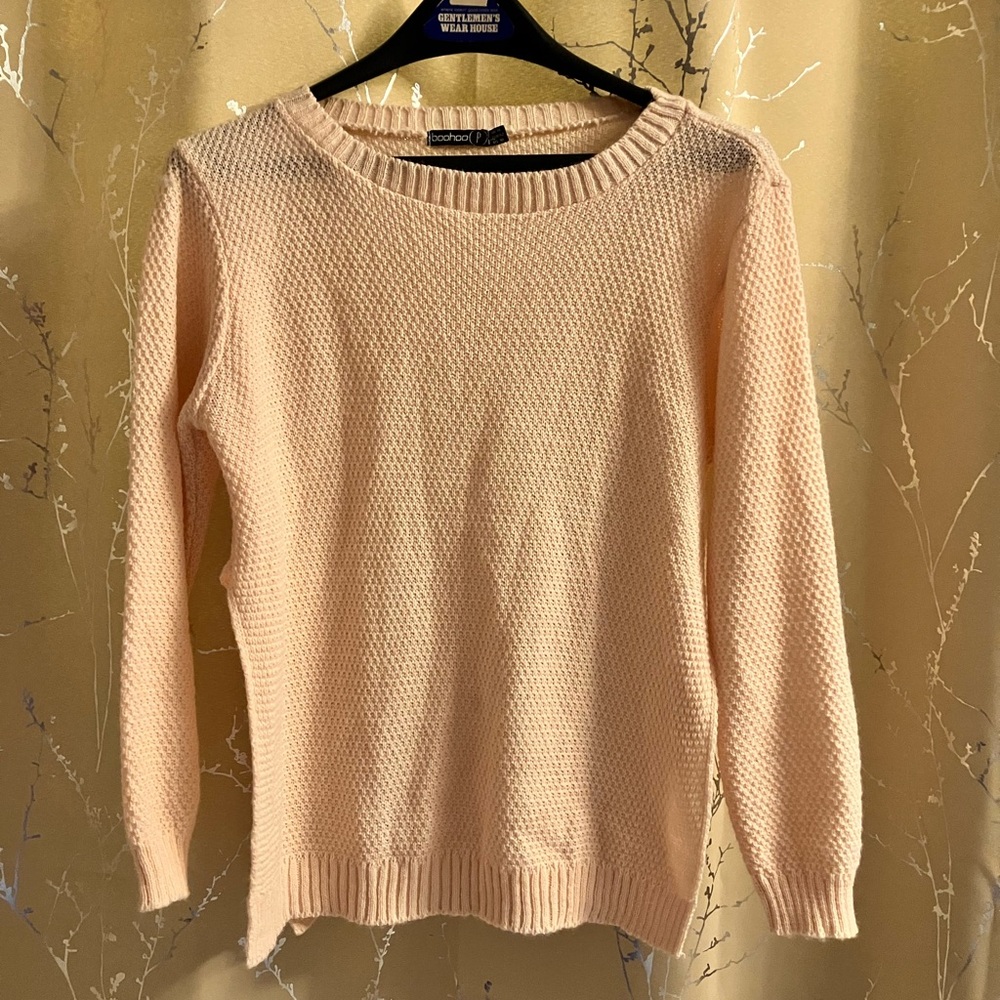 Crew neck knit sweater. Made in Britain.